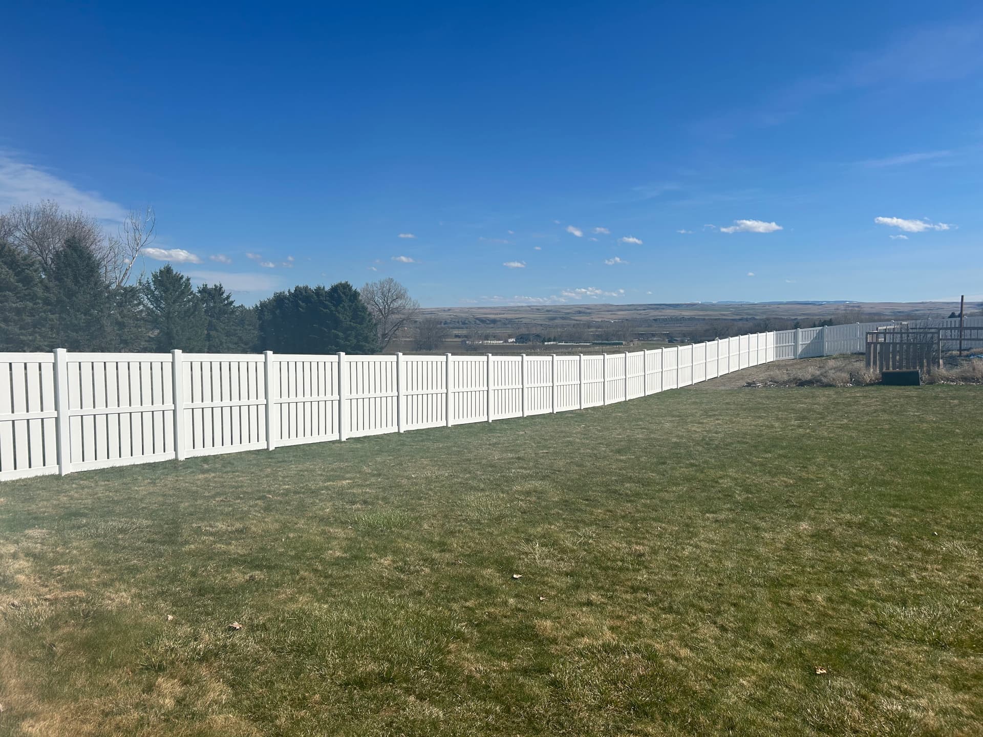 White Vinyl Semi-Privacy Fence Installation in Laurel MT image