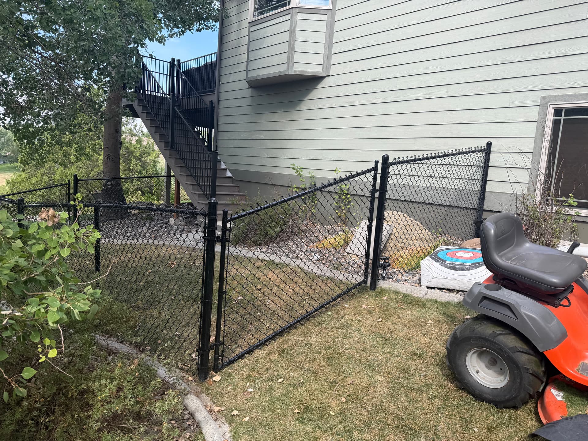 4-Foot Black Chain Link Dog Kennel Built Off the Deck image