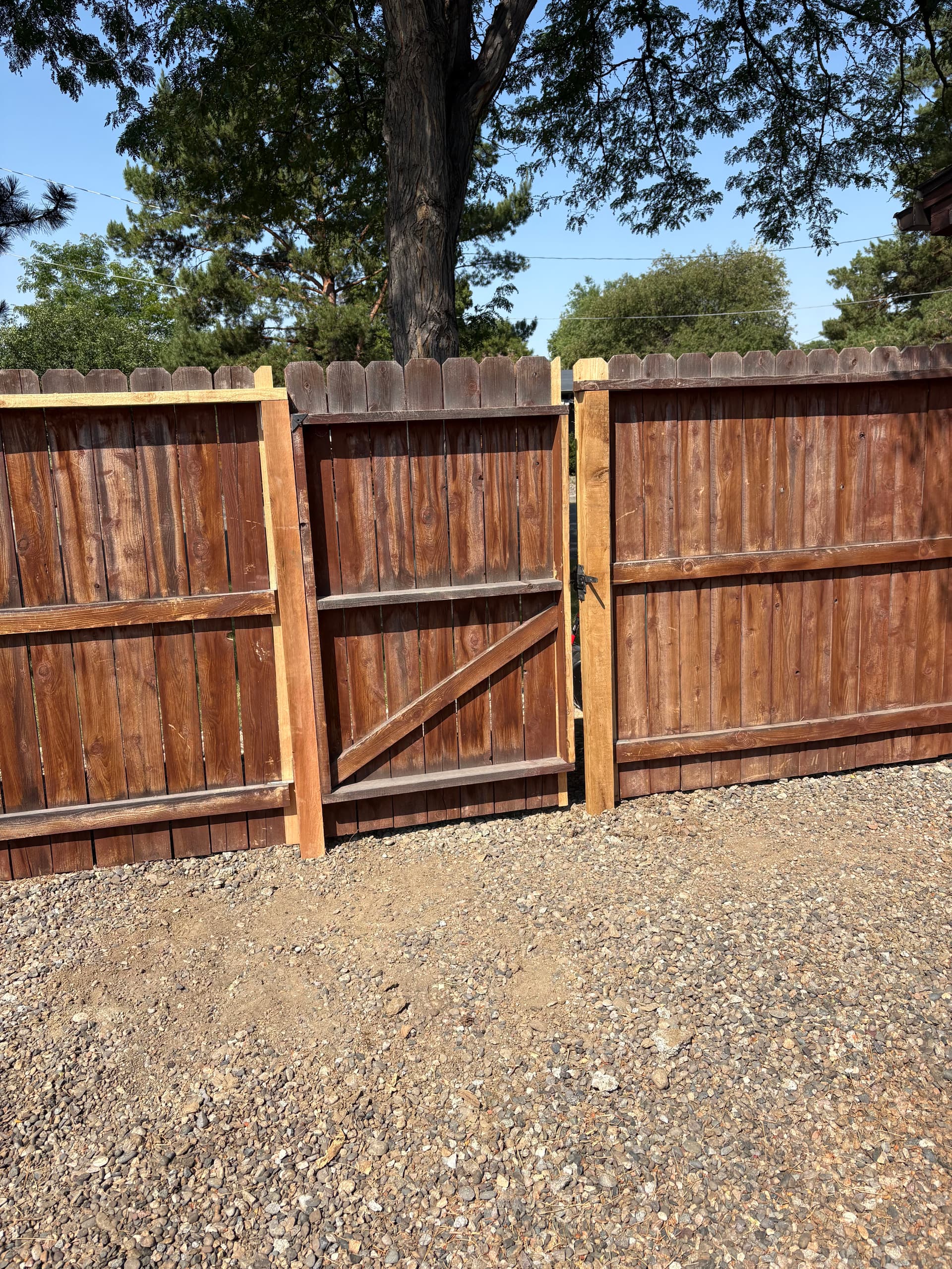 Gallery photos for New Wood Posts and Double Gate Bring This Fence Back to Life: Image #1