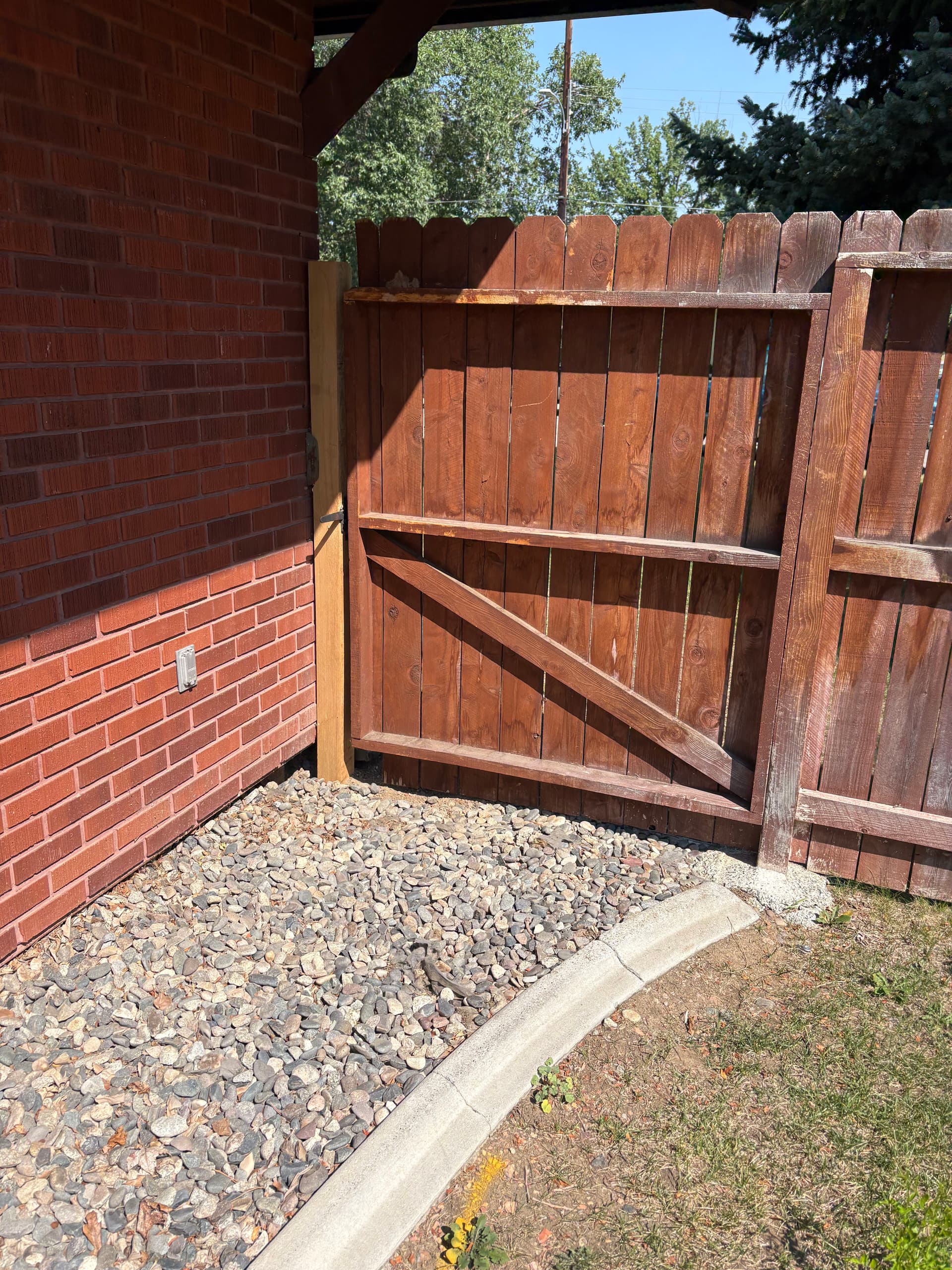 Gallery photos for New Wood Posts and Double Gate Bring This Fence Back to Life: Image #2