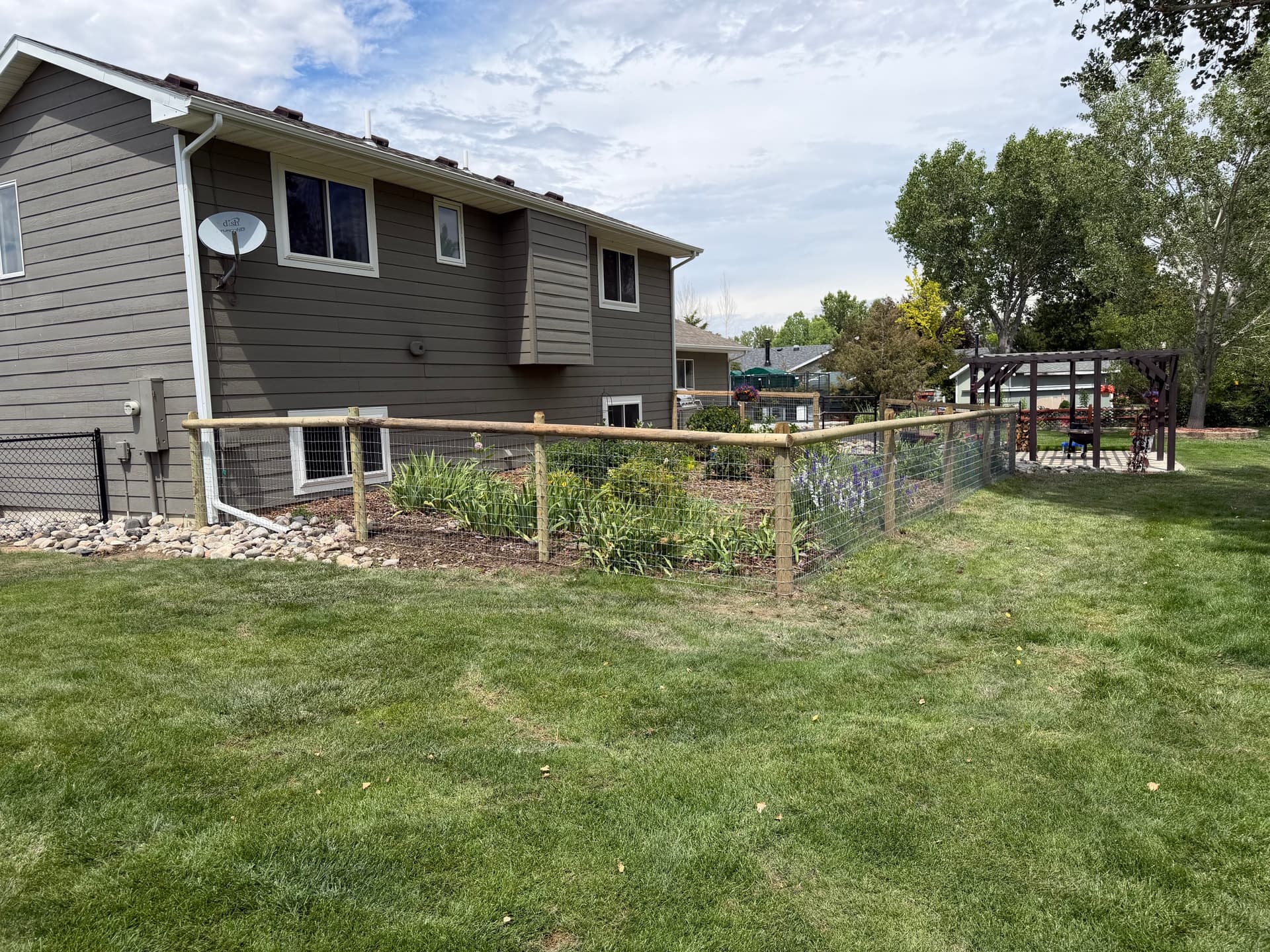 Garden Fence Build That Keeps Dogs Out and Flowers Thriving image