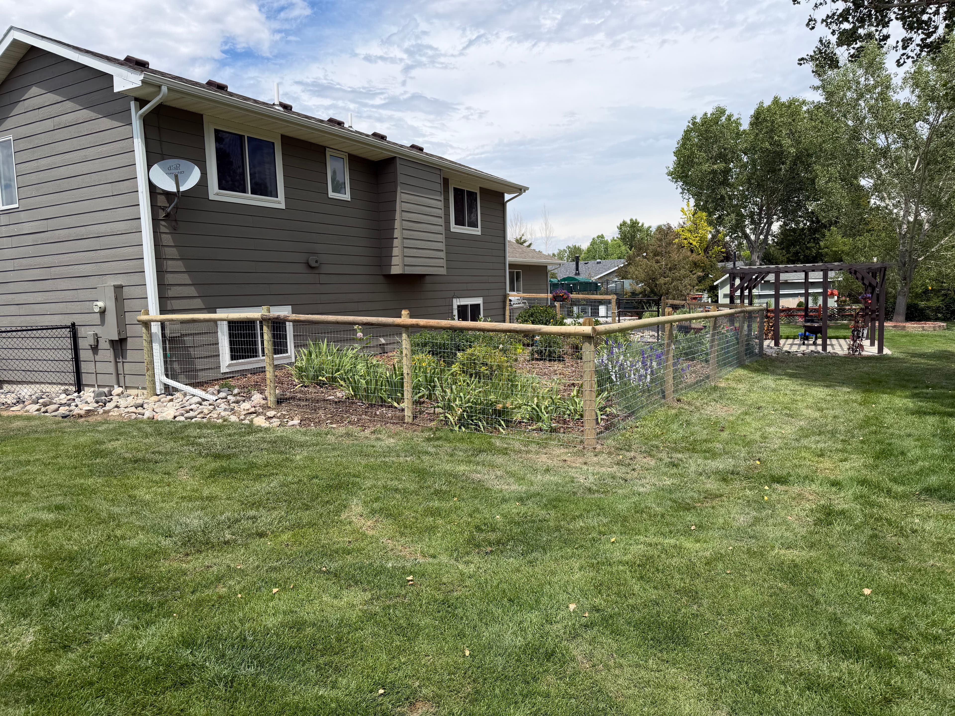 Project Garden Fence Build That Keeps Dogs Out and Flowers Thriving image
