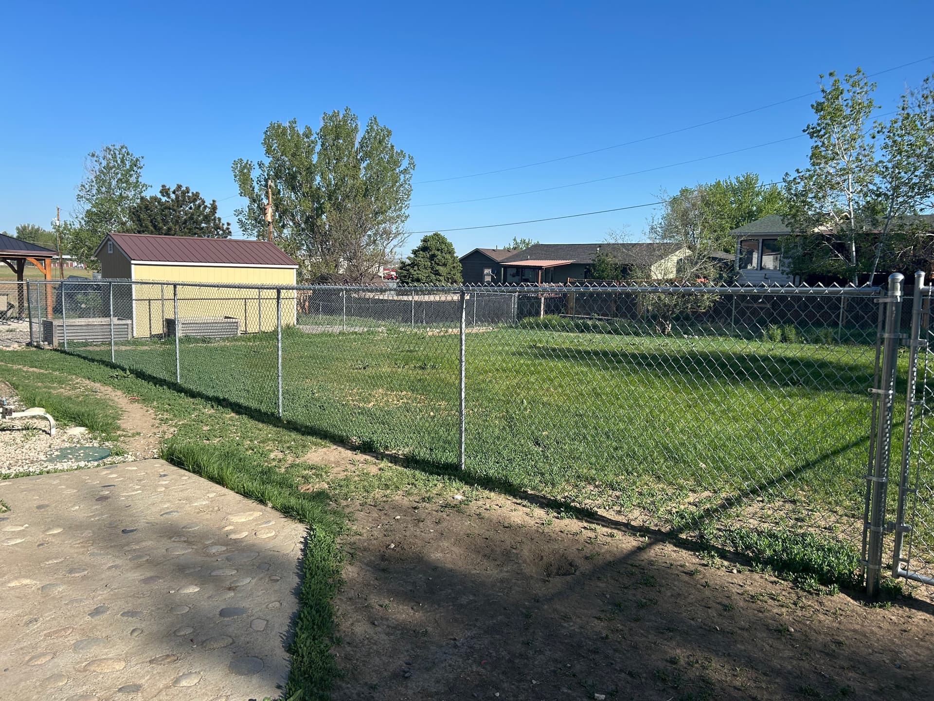 Gallery photos for 5-Foot Chain Link Fence and Gate Built for Dog Separation in Lockwood: Image #1