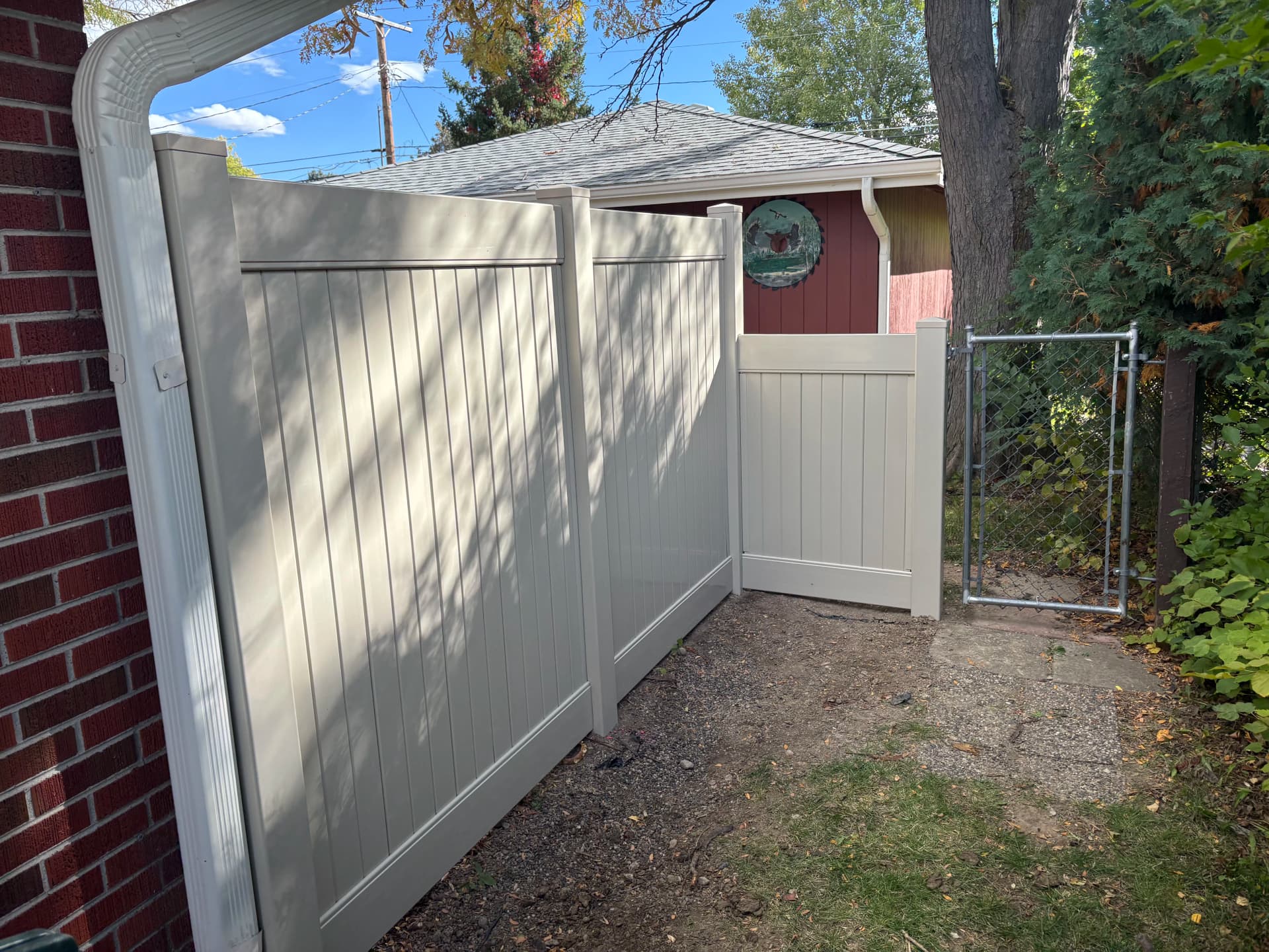 Gallery photos for Failing Wood Fence Replaced With Clean Vinyl Privacy Fence: Image #1