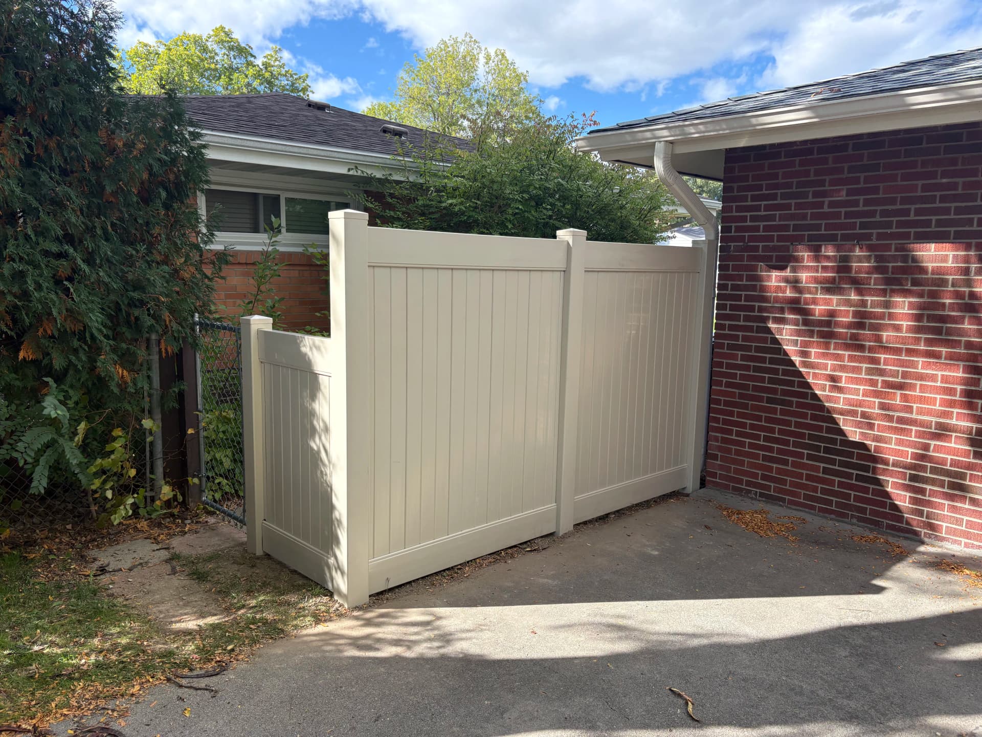 Failing Wood Fence Replaced With Clean Vinyl Privacy Fence image