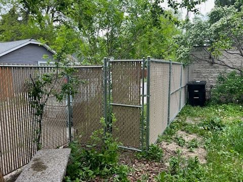 Gallery photos for Secure Chain-Link Fence with Tan Privacy Slats: Image #1