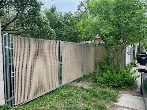 Gallery photos for Secure Chain-Link Fence with Tan Privacy Slats: Image #2
