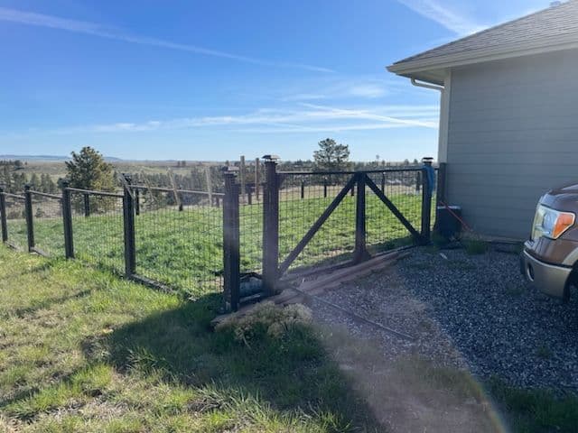 Robust Rural Chain-Link Fence Installation image