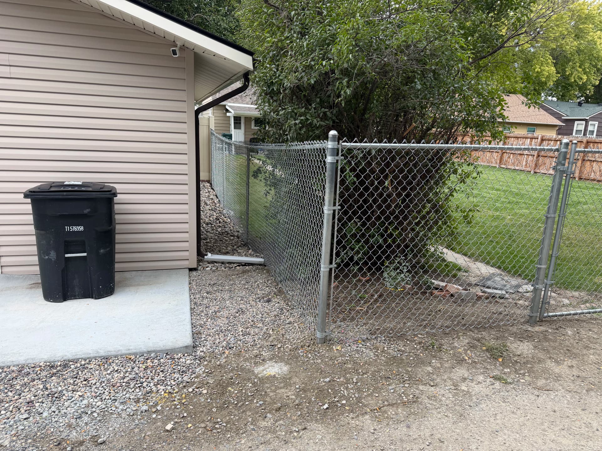 Gallery photos for 5-Foot Chain Link Fence Fully Encloses Backyard Along Alleyway: Image #1