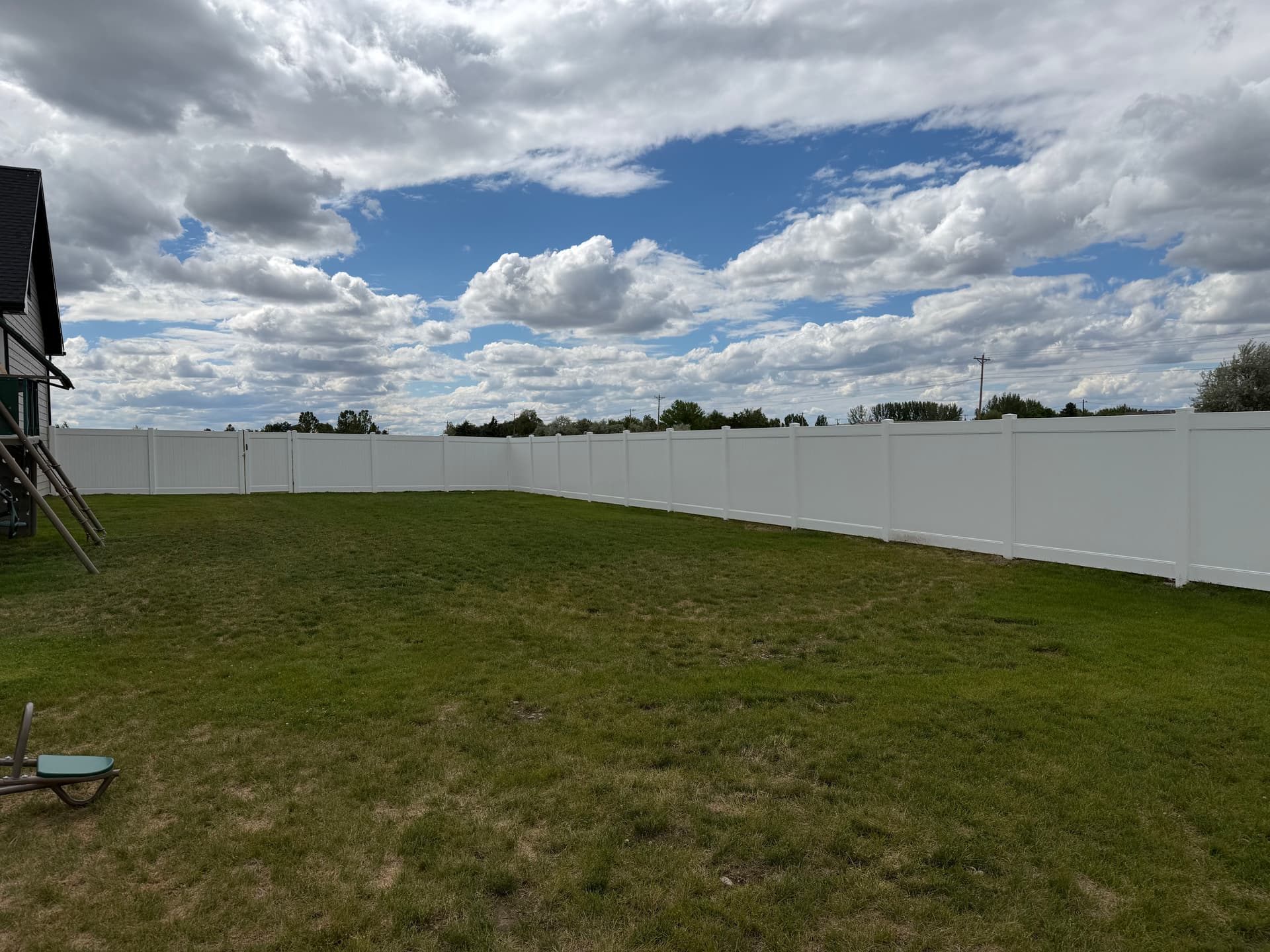 Gallery photos for Full Backyard Vinyl Privacy Fence Installed for a Family of 8: Image #1